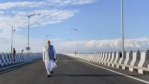 Prime Minister Narendra Modi strolls on the Bogibeel Bridge, the longest rail-cum-road bridge on Brahmaputra river, after it was inaugurated by him on December 25, 2018.(PTI file photo) Prime Minister Narendra Modi strolls on the Bogibeel Bridge, the longest rail-cum-road bridge on Brahmaputra river, after it was inaugurated by him on December 25, 2018.(PTI file photo)