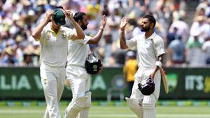 India's batsmen Cheteshwar Pujara (C) and Virat Kohli (R) walk back at lunch during day two of the third cricket Test match between Australia and India in Melbourne on December 27, 2018.(AFP) India's batsmen Cheteshwar Pujara (C) and Virat Kohli (R) walk back at lunch during day two of the third cricket Test match between Australia and India in Melbourne on December 27, 2018.(AFP)
