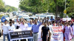 Parents association of Noida march in protest against the school over fee hike at city magistrate office, in Noida(HT Photo) Parents association of Noida march in protest against the school over fee hike at city magistrate office, in Noida(HT Photo)