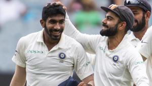 India's captain Virat Kohli, right, celebrates Jasprit Bumrah, left, after Bumrah got the wicket of Australia's Shaun Marsh during play on day three of the third cricket test between India and Australia in Melbourne.(AP) India's captain Virat Kohli, right, celebrates Jasprit Bumrah, left, after Bumrah got the wicket of Australia's Shaun Marsh during play on day three of the third cricket test between India and Australia in Melbourne.(AP)