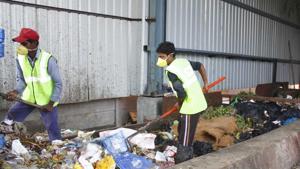 In September this year, Hindustan Times had reported that mixed waste was simply compacted and sent to the Bandhwari landfill instead of being segregated as per rules.(HT File) In September this year, Hindustan Times had reported that mixed waste was simply compacted and sent to the Bandhwari landfill instead of being segregated as per rules.(HT File)