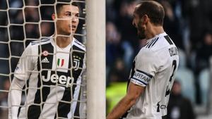 Juventus' Portuguese forward Cristiano Ronaldo (L) celebrates with Juventus' Italian defender Giorgio Chiellini.(AFP) Juventus' Portuguese forward Cristiano Ronaldo (L) celebrates with Juventus' Italian defender Giorgio Chiellini.(AFP)