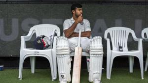 India's Mayank Agarwal sits on the bench before the start of play on day four of the third cricket test between India and Australia in Melbourne.(AP) India's Mayank Agarwal sits on the bench before the start of play on day four of the third cricket test between India and Australia in Melbourne.(AP)