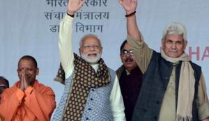 Prime Minister Narendra Modi flanked by MoS for Communications and Railways Manoj Sinha and Uttar Pradesh Chief Minister Yogi Adityanath during the foundation stone laying ceremony for a medical college, in Ghazipur, Saturday, Dec. 29, 2018.(PTI photo) Prime Minister Narendra Modi flanked by MoS for Communications and Railways Manoj Sinha and Uttar Pradesh Chief Minister Yogi Adityanath during the foundation stone laying ceremony for a medical college, in Ghazipur, Saturday, Dec. 29, 2018.(PTI photo)