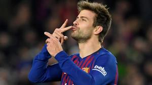 Barcelona's Spanish defender Gerard Pique celebrates after scoring.(AFP) Barcelona's Spanish defender Gerard Pique celebrates after scoring.(AFP)