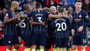 Manchester City's Sergio Aguero celebrates with team mates after scoring their third goal.(REUTERS) Manchester City's Sergio Aguero celebrates with team mates after scoring their third goal.(REUTERS)