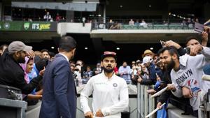 India skipper Virat Kohli walks onto the Melbourne Cricket Ground on Sunday.(AP) India skipper Virat Kohli walks onto the Melbourne Cricket Ground on Sunday.(AP)