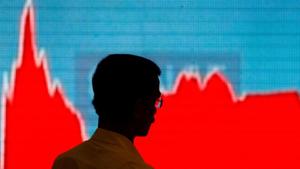 A man walks past a screen displaying news of markets update inside the Bombay Stock Exchange (BSE) building in Mumbai, India. (Representative Photo)(REUTERS) A man walks past a screen displaying news of markets update inside the Bombay Stock Exchange (BSE) building in Mumbai, India. (Representative Photo)(REUTERS)
