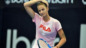 Czech Republic's Karolina Pliskova gets ready to serve during a practice session.(AFP)