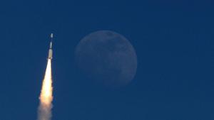 The Indian military communication satellite GSAT-7A is pictured next to the moon as it is launched into orbit on the Indian Space Research Organisation (ISRO)'s Geosynchronous Satellite Launch Vehicle (GSLV) in Sriharikota in the state of Andhra Pradesh on December 19, 2018.(AFP Photo)