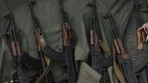 A day after suspected militants fled with four AK 47 rifles from the official residence of a Congress legislator in Srinagar, four policemen posted there for security were dismissed from service (Representative Photo)(AP) A day after suspected militants fled with four AK 47 rifles from the official residence of a Congress legislator in Srinagar, four policemen posted there for security were dismissed from service (Representative Photo)(AP)