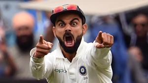 India's captain Virat Kohli celebrates the wicket of Australia's Pat Cummins.(AFP) India's captain Virat Kohli celebrates the wicket of Australia's Pat Cummins.(AFP)