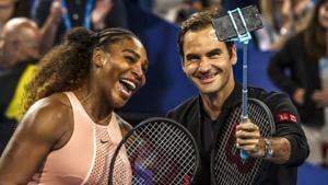 Serena Williams and Roger Federer take a selfie after their mixed doubles match on day four of the Hopman Cup.(AFP) Serena Williams and Roger Federer take a selfie after their mixed doubles match on day four of the Hopman Cup.(AFP)