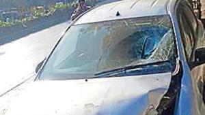 The car, being driven by a 65-year-old man, crashed into a pole after hitting the woman.(HT Photo) The car, being driven by a 65-year-old man, crashed into a pole after hitting the woman.(HT Photo)