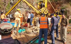 This undated file handout photo from the National Disaster Response Force released to AFP on December 17, 2018, shows emergency workers gathering around a crane after 15 miners were trapped by flooding in an illegal coal mine in Ksan village in Meghalaya's East Jaintia Hills district(AFP) This undated file handout photo from the National Disaster Response Force released to AFP on December 17, 2018, shows emergency workers gathering around a crane after 15 miners were trapped by flooding in an illegal coal mine in Ksan village in Meghalaya's East Jaintia Hills district(AFP)