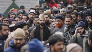 Hurriyat leader and chief cleric of Srinagar mosque, Jamia Masjid, Mirwaiz Umar Farooq on Wednesday led a rally against the desecration of the mosque by a group of masked youth carrying IS flags.(AP) Hurriyat leader and chief cleric of Srinagar mosque, Jamia Masjid, Mirwaiz Umar Farooq on Wednesday led a rally against the desecration of the mosque by a group of masked youth carrying IS flags.(AP)