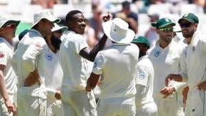 South African bowler Kagiso Rabada (C) celebrates with teammates the dismissal of Pakistan's batsman Shan Masood.(AFP)