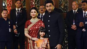 Aishwarya Rai Bachchan and Abhishek Bachchan with daughter Aaradhya pose for a picture as they attend the wedding ceremony of Isha Ambani.(AFP) Aishwarya Rai Bachchan and Abhishek Bachchan with daughter Aaradhya pose for a picture as they attend the wedding ceremony of Isha Ambani.(AFP)