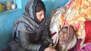 Former Jammu and Kashmir chief minister Mehbooba Mufti visits the family of a slain militant in Shopian district of Jammu and Kashmir on Thursday.(HT PHOTO) Former Jammu and Kashmir chief minister Mehbooba Mufti visits the family of a slain militant in Shopian district of Jammu and Kashmir on Thursday.(HT PHOTO)