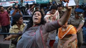 Police intervene as members of Sabarimala Karma Samithi try to disrupt a celebratory meeting after two women entered Sabarimala Ayyapa temple, at the High Court Junction in Kochi in the Indian state of Kerala on January 2, 2019(AFP) Police intervene as members of Sabarimala Karma Samithi try to disrupt a celebratory meeting after two women entered Sabarimala Ayyapa temple, at the High Court Junction in Kochi in the Indian state of Kerala on January 2, 2019(AFP)