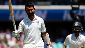 India's Cheteshwar Pujara (L) reacts as he walks off the ground after being dismissed, as teammate Rishabh Pant (R) looks on during the second day of the fourth and final cricket Test between India and Australia at the Sydney Cricket Ground.(AFP) India's Cheteshwar Pujara (L) reacts as he walks off the ground after being dismissed, as teammate Rishabh Pant (R) looks on during the second day of the fourth and final cricket Test between India and Australia at the Sydney Cricket Ground.(AFP)