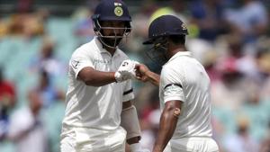 India's Mayank Agarwal, right, and Cheteshwar Pujara encourage each other.(AP) India's Mayank Agarwal, right, and Cheteshwar Pujara encourage each other.(AP)