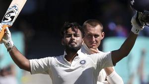 India's Rishabh Pant, left, celebrates making 100 runs as Australia's Marnus Labuschagne watches on day 2 during their cricket test match in Sydney.(AP) India's Rishabh Pant, left, celebrates making 100 runs as Australia's Marnus Labuschagne watches on day 2 during their cricket test match in Sydney.(AP)