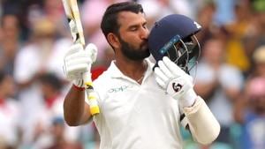 Cheteshwar Pujara kisses his helmet after reaching his century.(AFP) Cheteshwar Pujara kisses his helmet after reaching his century.(AFP)