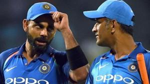 Indian captain Virat Kohli (L) chats with wicketkeeper MS Dhoni.(AFP/Getty Images) Indian captain Virat Kohli (L) chats with wicketkeeper MS Dhoni.(AFP/Getty Images)
