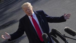 US President Donald Trump speaks as he departs the White House in Washington, DC, on January 6, 2019, for meetings at Camp David. President Donald Trump stood firm Sunday on his demand for billions of dollars to fund a border wall with Mexico, which has forced a shutdown of the US government now entering its third week."We have to build the wall," Trump told reporters as he left the White House for the Camp David presidential retreat, while conceding that the barrier could be "steel instead of concrete." (Photo by Jim WATSON / AFP)(AFP) US President Donald Trump speaks as he departs the White House in Washington, DC, on January 6, 2019, for meetings at Camp David. President Donald Trump stood firm Sunday on his demand for billions of dollars to fund a border wall with Mexico, which has forced a shutdown of the US government now entering its third week."We have to build the wall," Trump told reporters as he left the White House for the Camp David presidential retreat, while conceding that the barrier could be "steel instead of concrete." (Photo by Jim WATSON / AFP)(AFP)