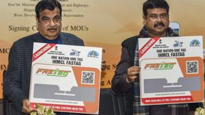 Transport Minister Nitin Gadkari with Petroleum Minister Dharmendra Pradhan launch the the IHMCL FASTAG after the signing of MoUs between HMCL and Oil Marketing Companies for issuance of IHMCL FASTAG through fuel-filling stations, in New Delhi on Jan 7.(PTI photo) Transport Minister Nitin Gadkari with Petroleum Minister Dharmendra Pradhan launch the the IHMCL FASTAG after the signing of MoUs between HMCL and Oil Marketing Companies for issuance of IHMCL FASTAG through fuel-filling stations, in New Delhi on Jan 7.(PTI photo)