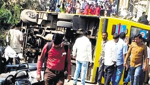 Podar International School bus overturned in Ambegaon on Wednesday.(HT PHOTO) Podar International School bus overturned in Ambegaon on Wednesday.(HT PHOTO)