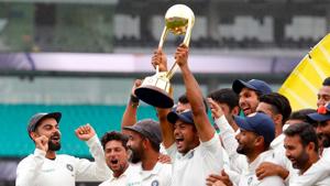 India's captain Virat Kohli (left) celebrates with teammates as they pose with the trophy after winning the Test series against Australia.(AFP) India's captain Virat Kohli (left) celebrates with teammates as they pose with the trophy after winning the Test series against Australia.(AFP)