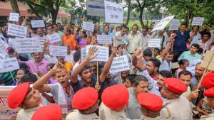 Guwahati: Kalita Janagosthi Sanmilan activists raise slogans during a protest demanding Schedule Tribe (ST) status at Six Mile, in Guwahati, Friday, Oct 05, 2018. (PTI Photo)(PTI10_5_2018_000064B)(PTI) Guwahati: Kalita Janagosthi Sanmilan activists raise slogans during a protest demanding Schedule Tribe (ST) status at Six Mile, in Guwahati, Friday, Oct 05, 2018. (PTI Photo)(PTI10_5_2018_000064B)(PTI)