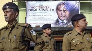 Police personnel keep vigil on the first day of screening of 'The Accidental Prime Minister' in Bhopal on Friday.(PTI) Police personnel keep vigil on the first day of screening of 'The Accidental Prime Minister' in Bhopal on Friday.(PTI)