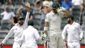 South Africa's batsman Dean Elgar, front, reacts as Pakistan players celebrates his wicket during day two of the third cricket test match between South Africa and Pakistan.(AP) South Africa's batsman Dean Elgar, front, reacts as Pakistan players celebrates his wicket during day two of the third cricket test match between South Africa and Pakistan.(AP)