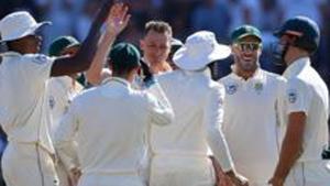 South African bowler Dale Steyn (C) celebrates with teammates after the fall of a wicket.(AFP) South African bowler Dale Steyn (C) celebrates with teammates after the fall of a wicket.(AFP)