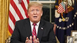 In this Jan. 8, 2019, photo, President Donald Trump speaks from the Oval Office of the White House as he gives a prime-time address about border security in Washington. (Carlos Barria/Pool Photo via AP)(AP) In this Jan. 8, 2019, photo, President Donald Trump speaks from the Oval Office of the White House as he gives a prime-time address about border security in Washington. (Carlos Barria/Pool Photo via AP)(AP)