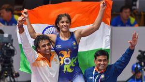 Vinesh Phogat celebrates after winning the Gold medal in women's freestyle 50 kg wrestling.(PTI) Vinesh Phogat celebrates after winning the Gold medal in women's freestyle 50 kg wrestling.(PTI)