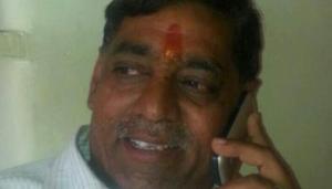 Police said Prahlad Bandhwar was standing outside the district cooperative bank when the assailant, who was riding an Enfield Bullet motorcycle came up and shot him on the head. Bandhwar collapsed and died on the spot.(ANI/Twitter) Police said Prahlad Bandhwar was standing outside the district cooperative bank when the assailant, who was riding an Enfield Bullet motorcycle came up and shot him on the head. Bandhwar collapsed and died on the spot.(ANI/Twitter)