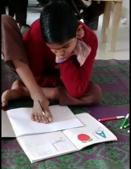 Aadarsh taking down notes in class with his toes.(HT Photo) Aadarsh taking down notes in class with his toes.(HT Photo)