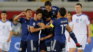 Japan's Tsukasa Shiotani celebrates scoring their second goal with team mates.(REUTERS) Japan's Tsukasa Shiotani celebrates scoring their second goal with team mates.(REUTERS)