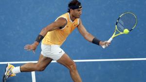 Rafael Nadal makes a forehand return to Australia's Alex de Minaur.(AP) Rafael Nadal makes a forehand return to Australia's Alex de Minaur.(AP)