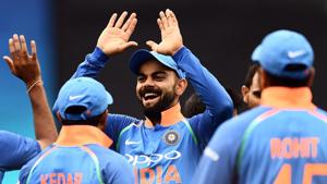 File image of India skipper Virat Kohli celebrating the fall of a wicket with his players.(AFP) File image of India skipper Virat Kohli celebrating the fall of a wicket with his players.(AFP)