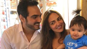 Esha Deol poses with husband, Bharat Takhtani and their daughter, Radhya.