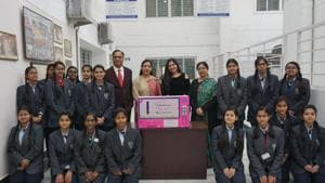 Founder and CEO of Panthalassa Mrinalini Mitra with the teachers and students of CMS, Gomti Nagar Extension, during the installation of a sanitary napkin dispensing machine at the institution.(Handout photo)