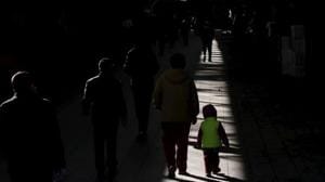 A girl walks with her grandmother at a market in Beijing, China.(REUTERS FILE PHOTO) A girl walks with her grandmother at a market in Beijing, China.(REUTERS FILE PHOTO)