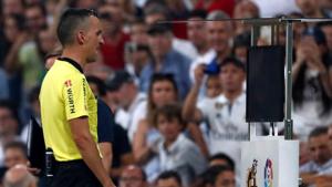 A La Liga Referee checks VAR at the Santiago Bernabeu, Madrid.(REUTERS) A La Liga Referee checks VAR at the Santiago Bernabeu, Madrid.(REUTERS)
