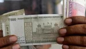 The Indian rupee Wednesday snapped its three-day losing streak and settled higher by 11 paise at 71.33 against the US dollar.(REUTERS) The Indian rupee Wednesday snapped its three-day losing streak and settled higher by 11 paise at 71.33 against the US dollar.(REUTERS)