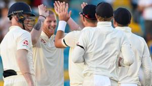 Ben Stokes (2L) of England celebrates the dismissal of Kemar Roach of West Indies.(AFP) Ben Stokes (2L) of England celebrates the dismissal of Kemar Roach of West Indies.(AFP)